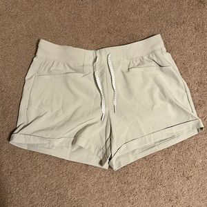 Tan avalanche shorts size medium